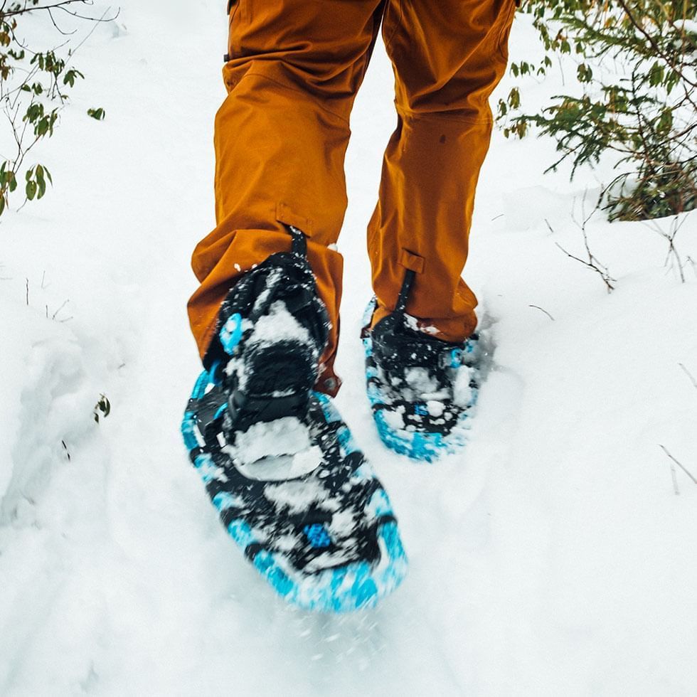 Close-up of snowshoes of a hiker near Falkensteiner Hotels