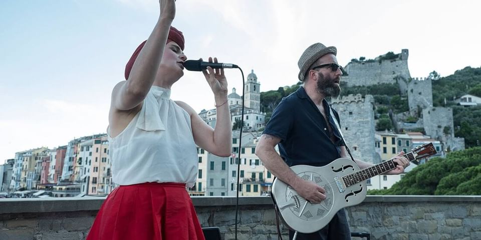 Singing and Playing Guitar - Grand Hotel Portovenere