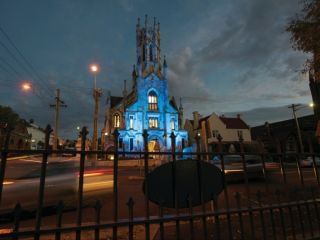 Illuminated church at night near Hotel Grand Chancellor Launceston