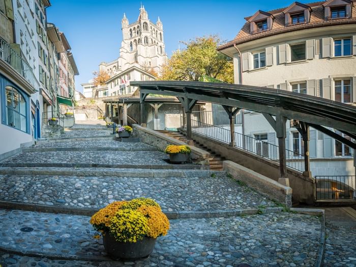 Charming street with cobblestone stairs in Lausanne city near Starling Hotel Lausanne