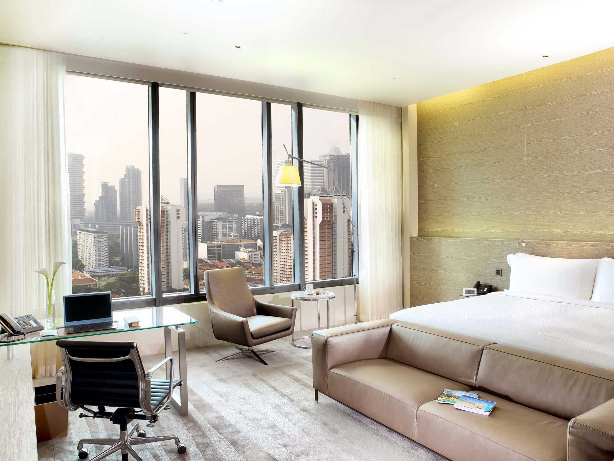Interior of Skyline studio with a city view at One Farrer Hotel
