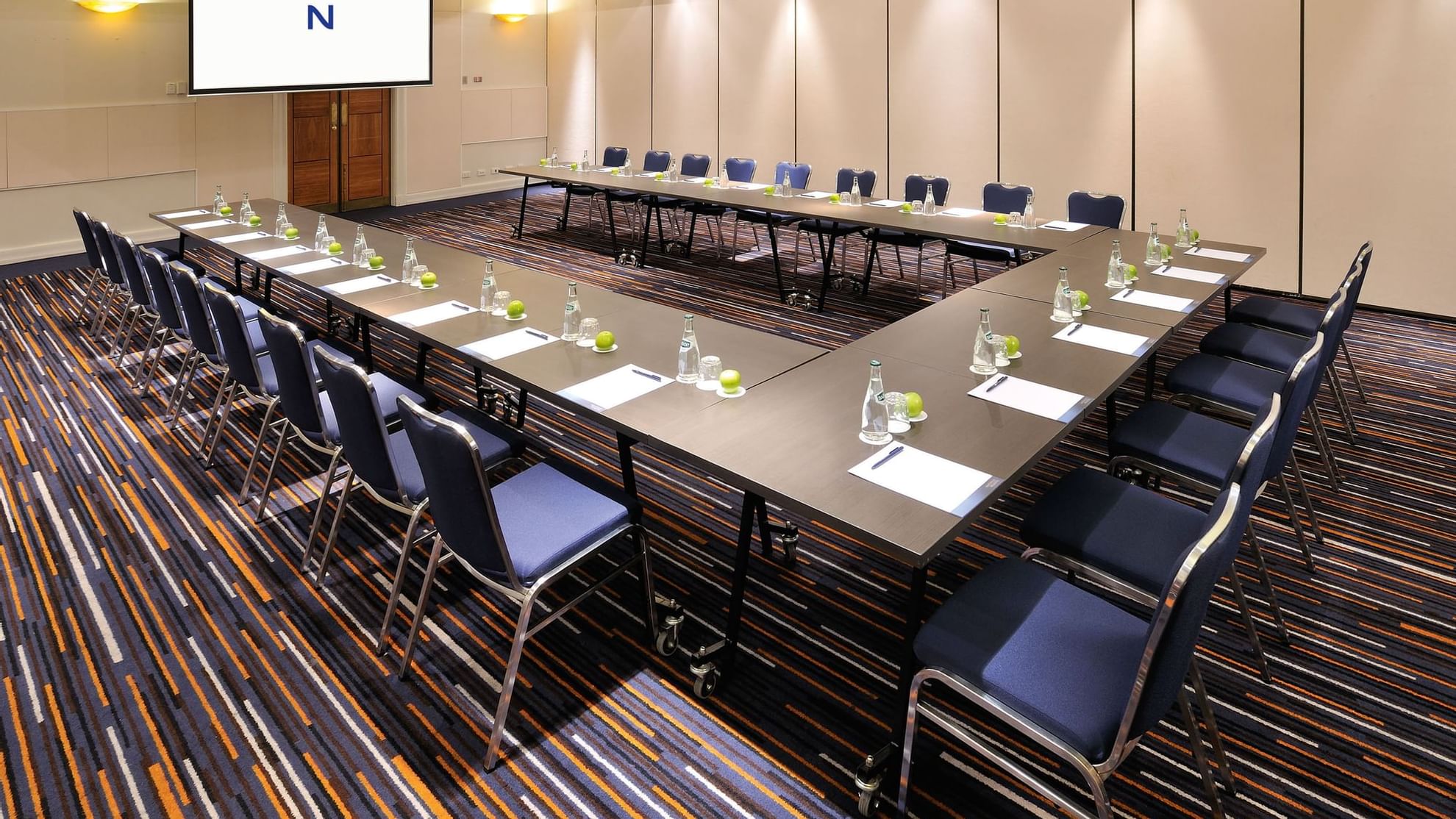 U-shaped table set-up in Waverley Room at Novotel Glen Waverley