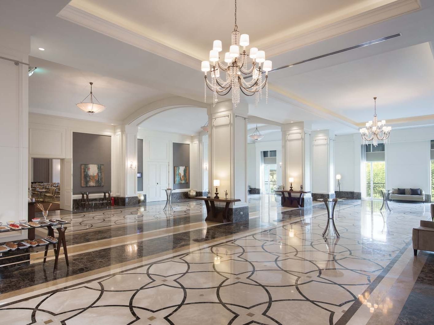 Spacious lobby area in Atlantic Foyer with marble floors at Titanic Deluxe Golf Belek