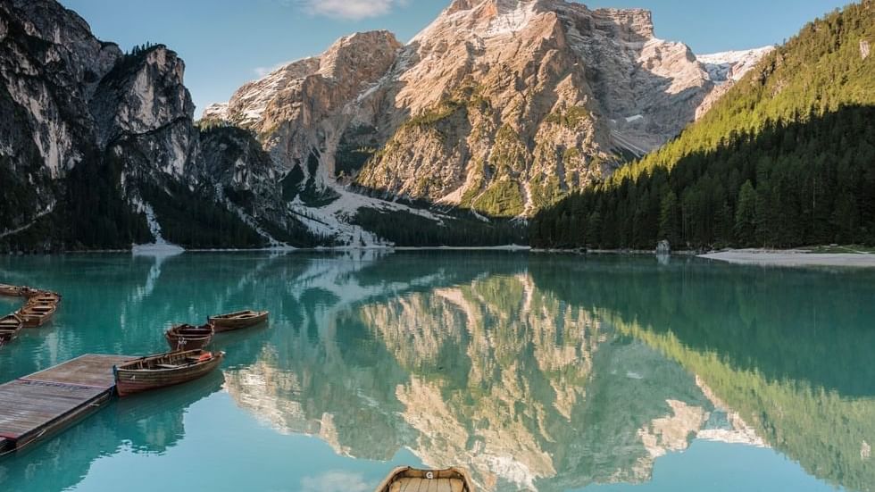 Boats in a mountain lake in Prags near Falkensteiner Hotels