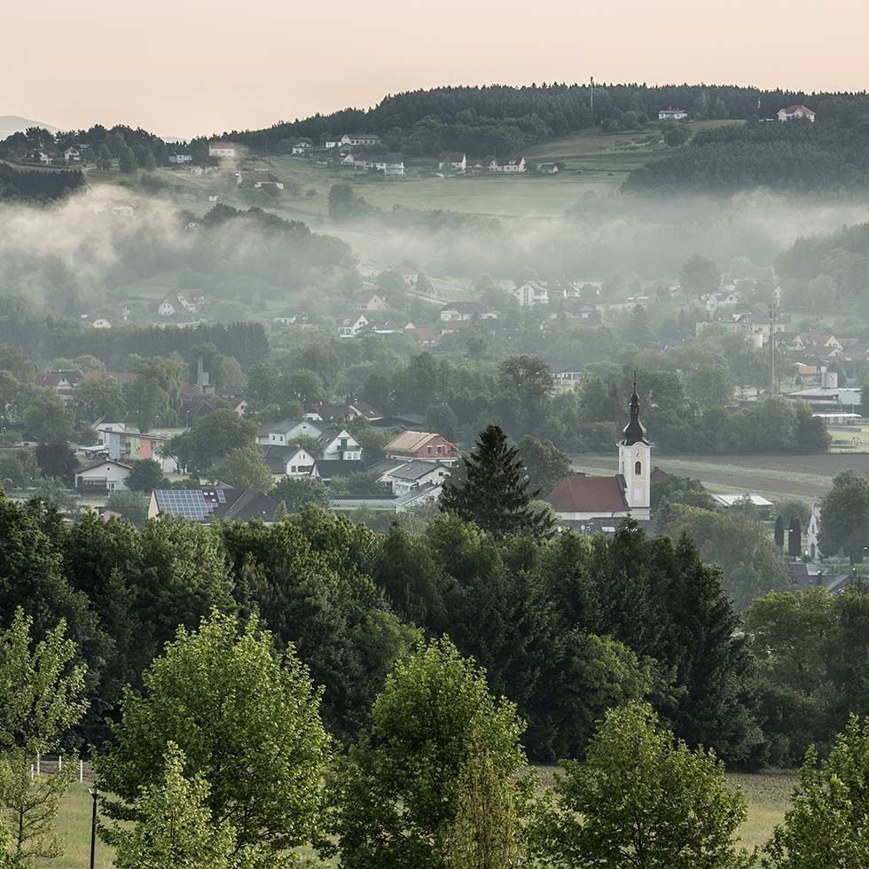 Hartberg city with mist near Falkensteiner Balance Resort Stegersbach