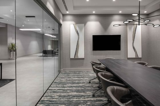 chairs at a conference table in a hotel