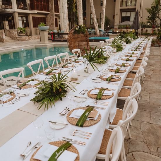 Tropical Poolside Wedding Set up at Pullman Palm Cove Resort