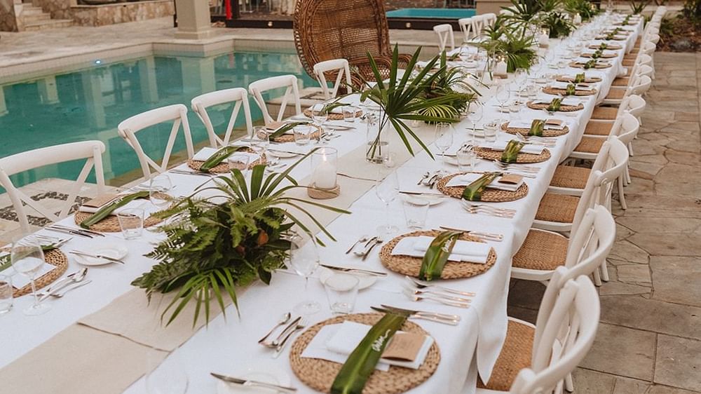 Tropical Poolside Wedding Set up at Pullman Palm Cove Resort