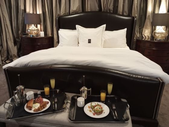 Luxurious bedroom with breakfast served on the bed at the inn at Willow grove