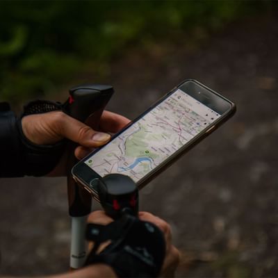 Man viewing maps from the phone at Falkensteiner Hotels