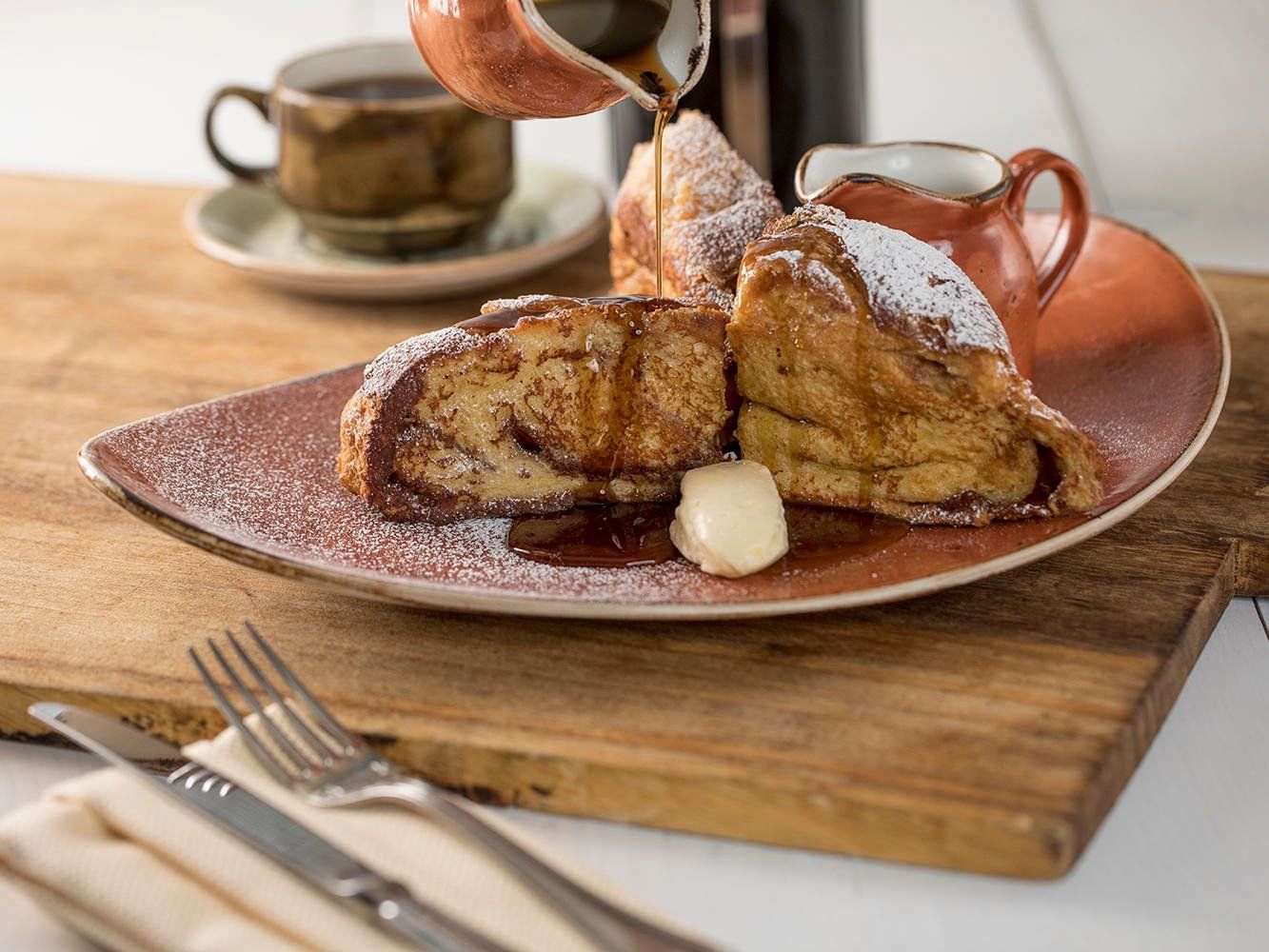 French toast with syrup served for breakfast at Peabody Hotels & Resorts