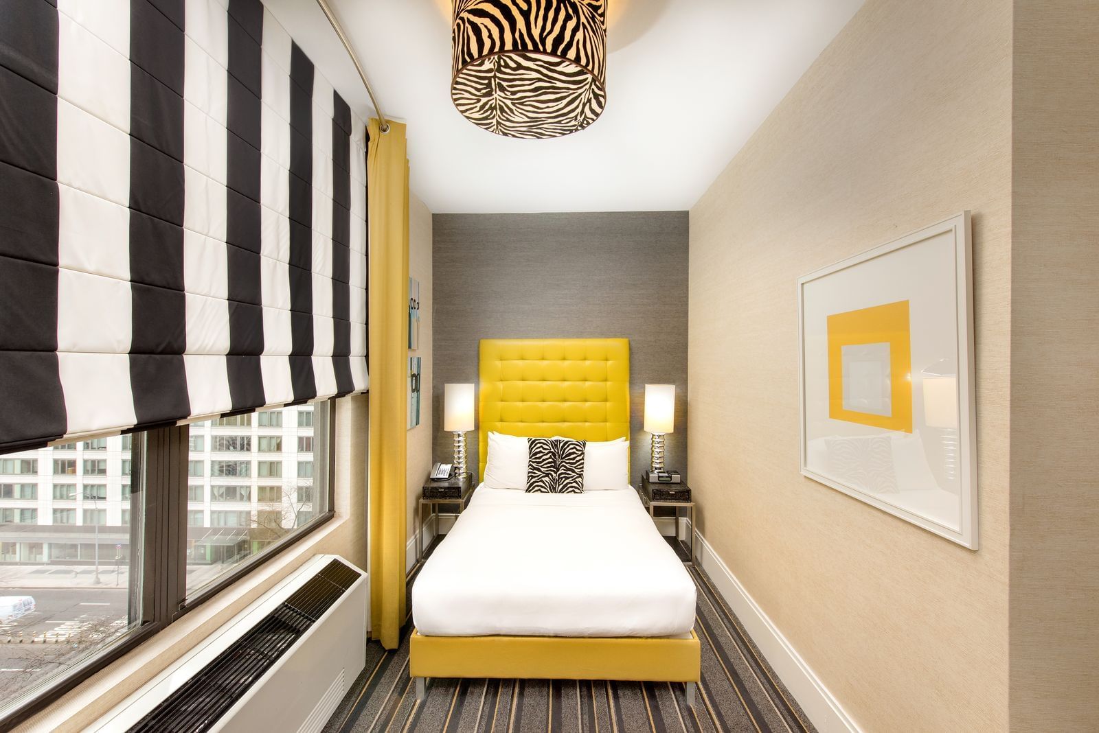 A bed in a hotel room