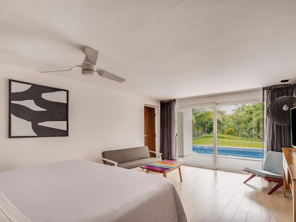 Interior of the guest room with king bed at FA Hotels