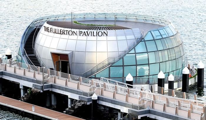 Image 24: Aerial view of The Fullerton Pavilion middle by the ocean near Fullerton Heritage Singapore