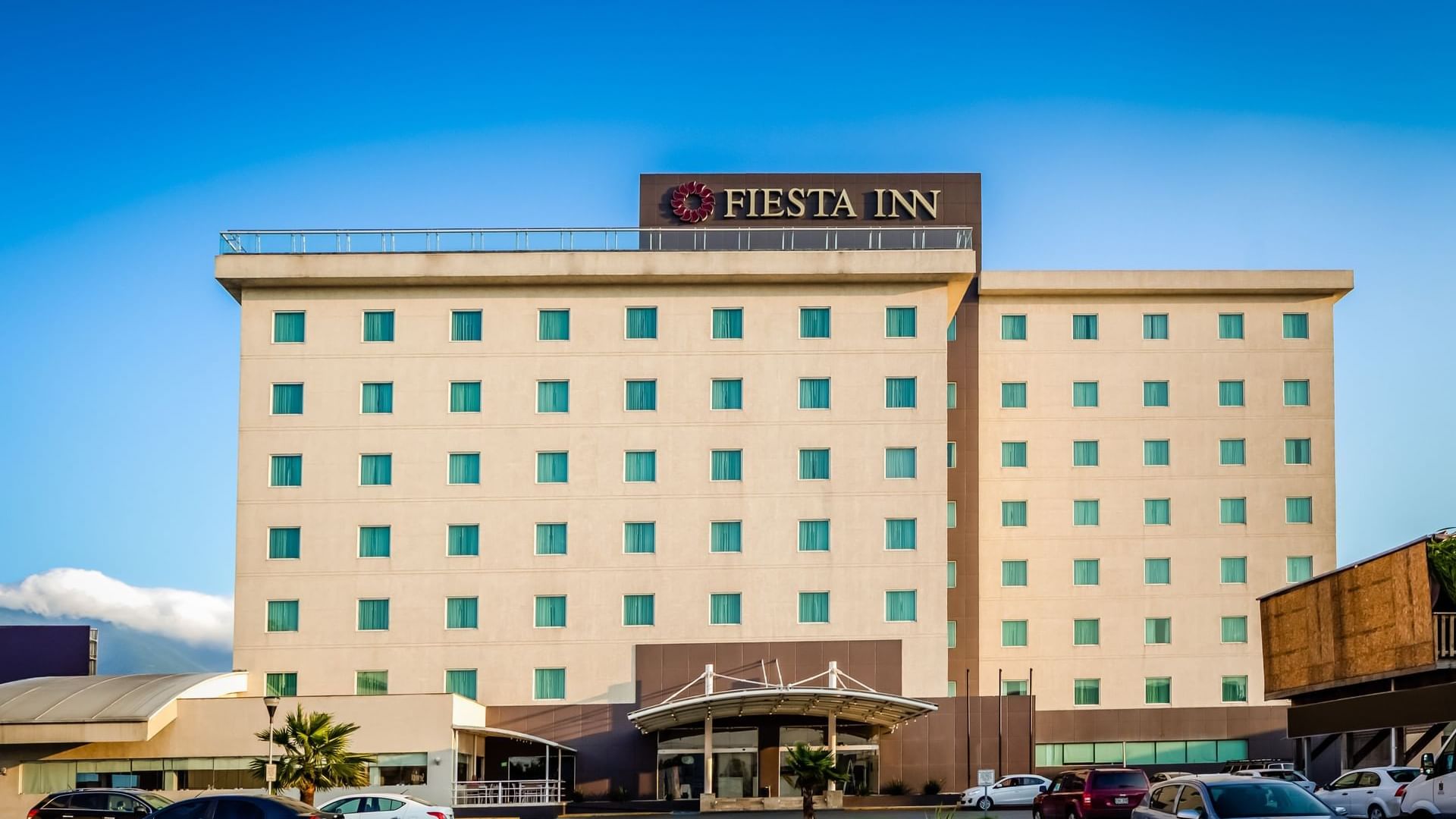 Exterior view of the hotel & car park at FI Monterrey Fundidora