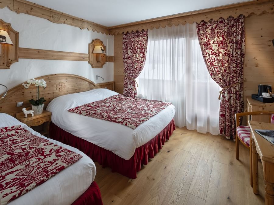Beds in Triple room for 3 people at The Originals Hotels