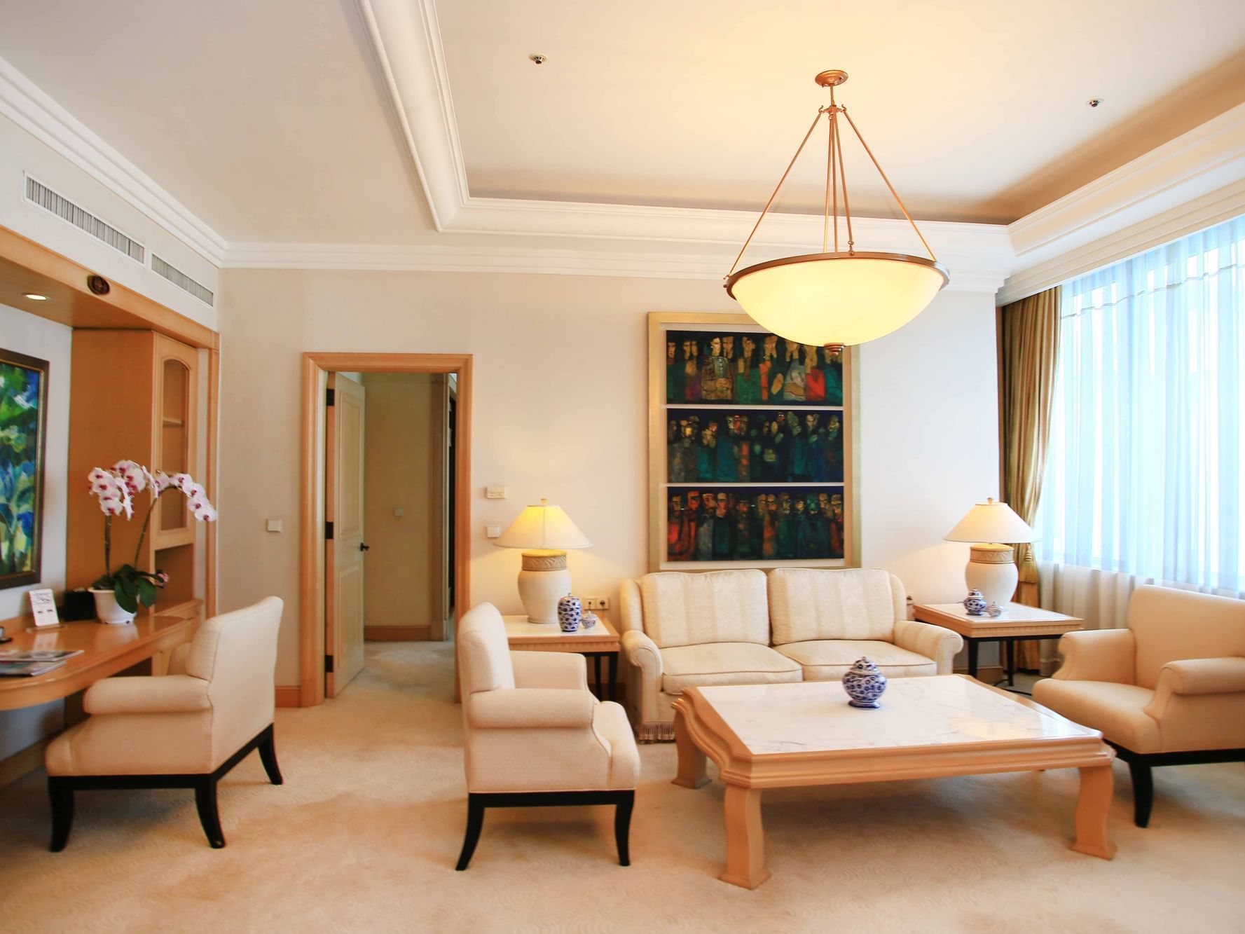 Senator Suite living area with wall art at Hanoi Daewoo Hotel