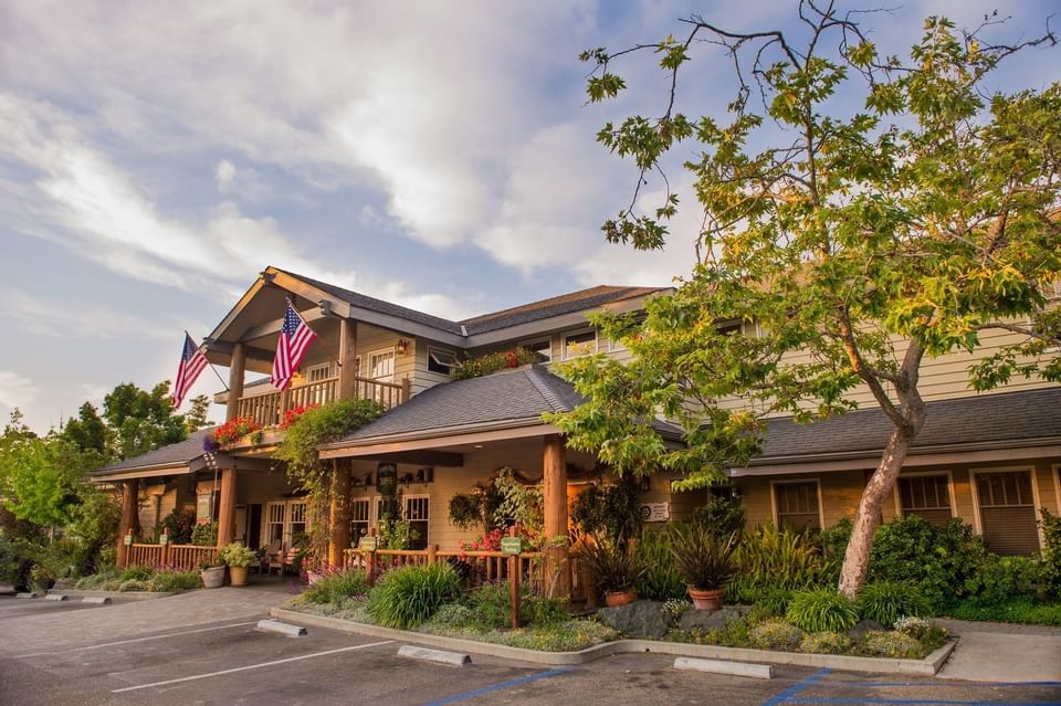 Front of Cambria Pines Lodge with front balcony, close parking s