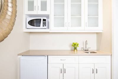 Interior of the kitchen in Presidential suite at Retro Suites
