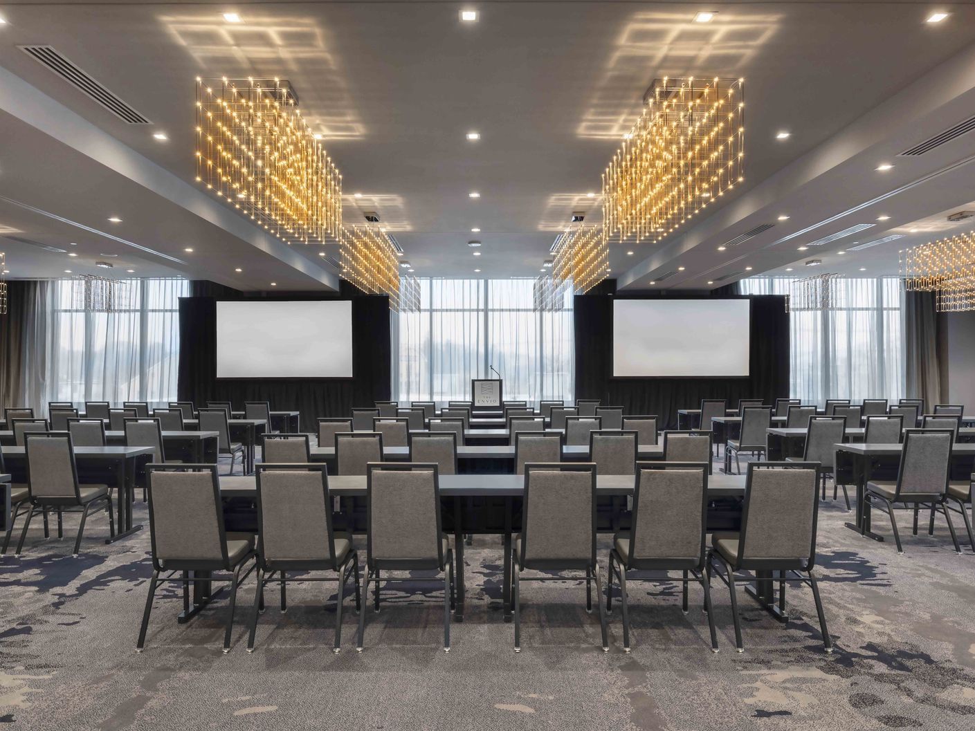 ballroom with meeting tables and chairs