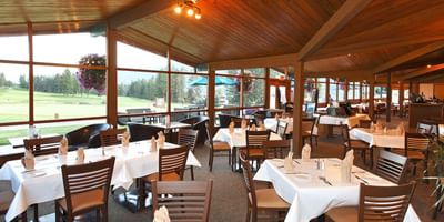 Dining table arranged in the Mountainside Grille at Fairmont Hot Springs Resort
