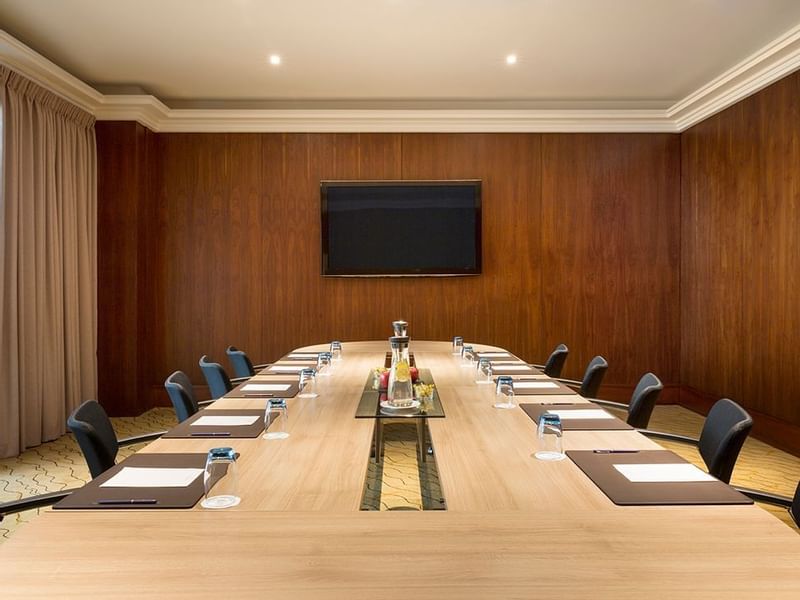 Close-up of well-arranged meeting table at Warwick Geneva