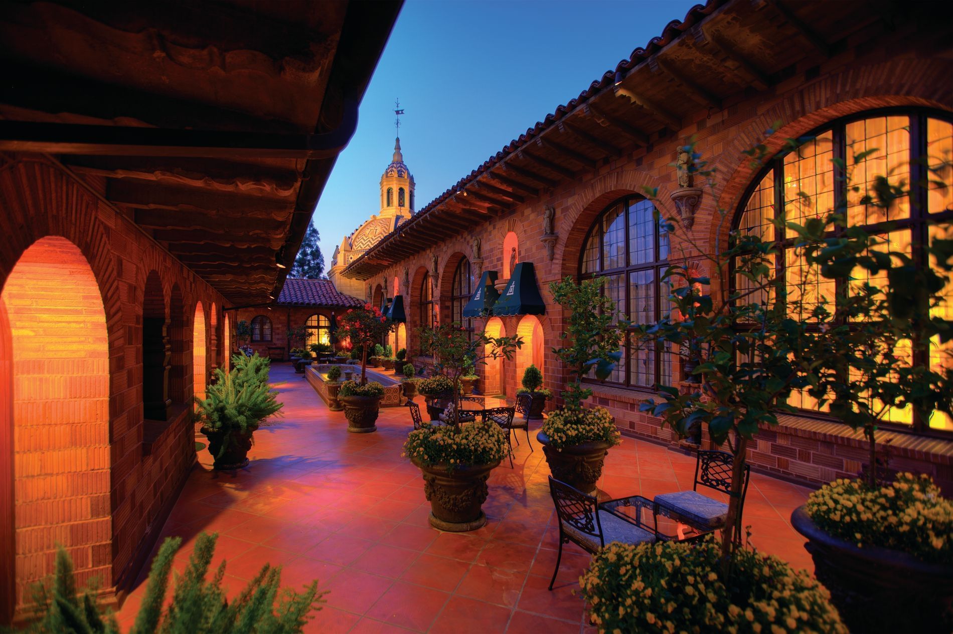 outdoor terrace at Mission Inn with tables and chairs