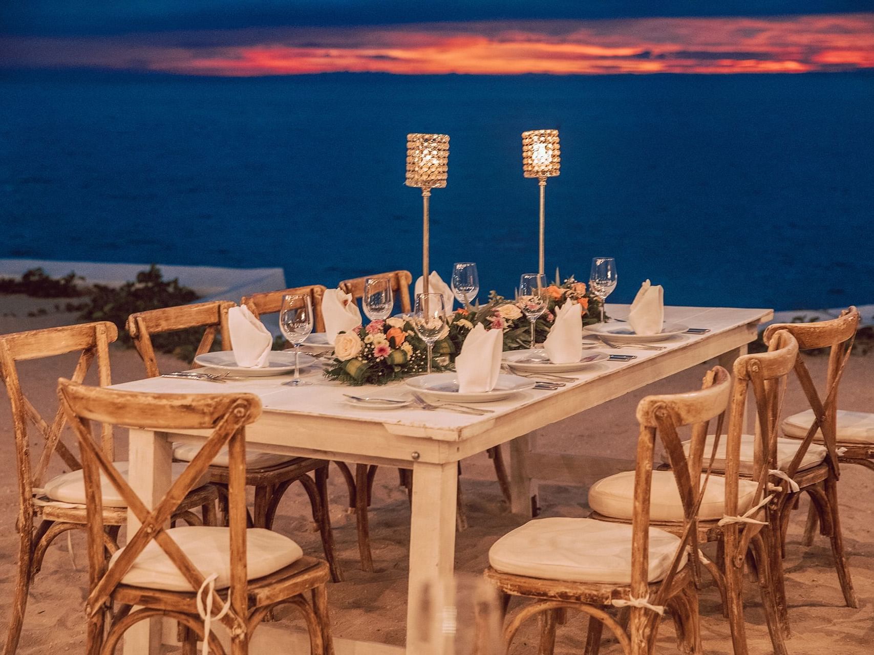Elegant dinner table in the beach at the La Colección Resorts
