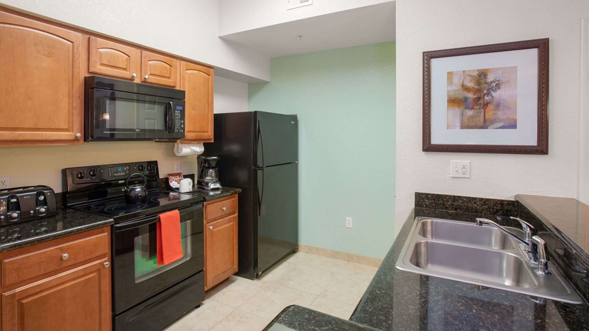 Fully-Equipped Kitchen in our spacious Orlando suites