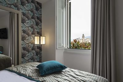 Harmonia Room with open windows at Sublimis Boutique Hotel Camogli