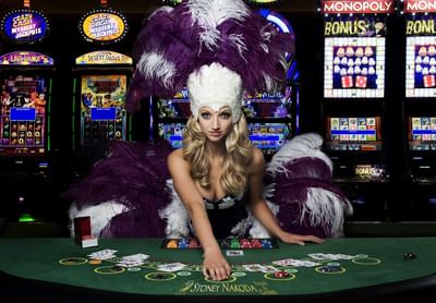 Woman near casino table at Stoney Nakoda Resort & Casino