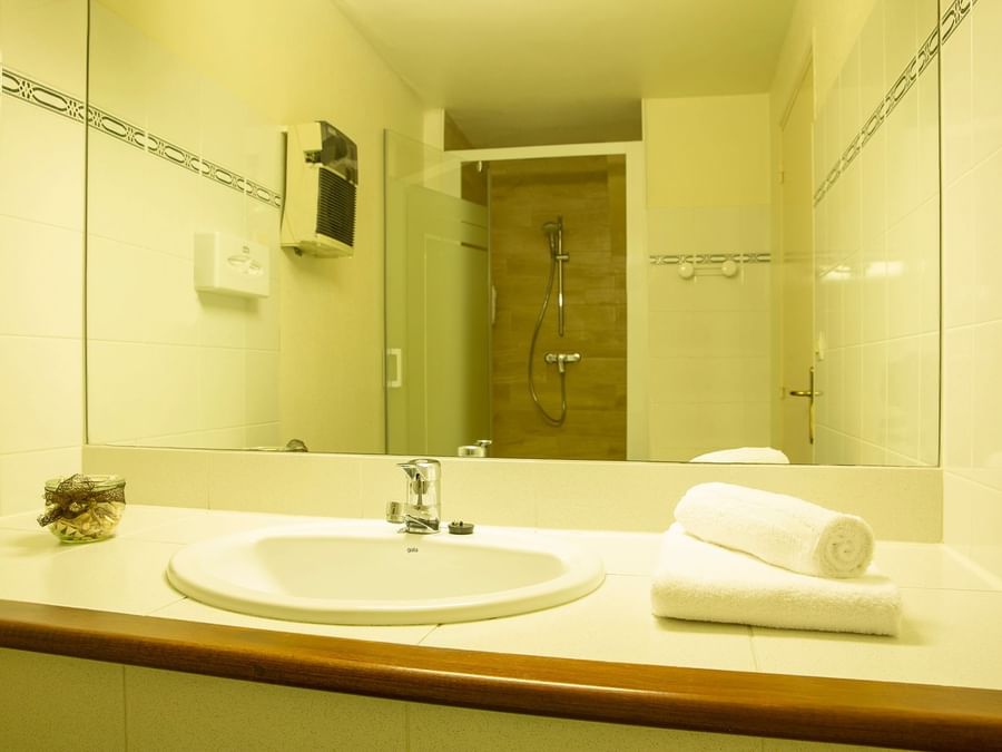 Bathroom vanity in bedrooms at Hotel Clos Sainte Marie