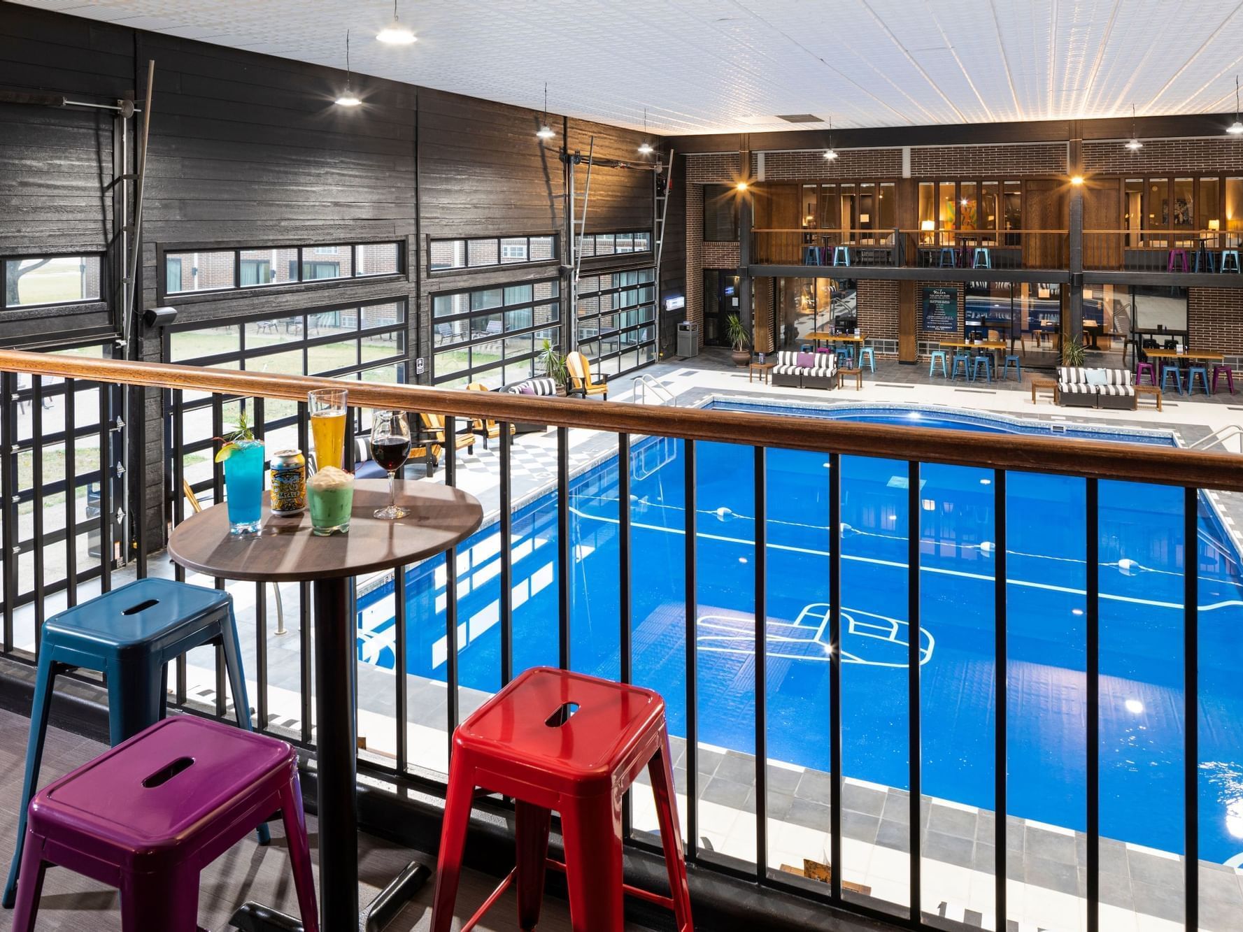 View of indoor pool from hotel room balcony