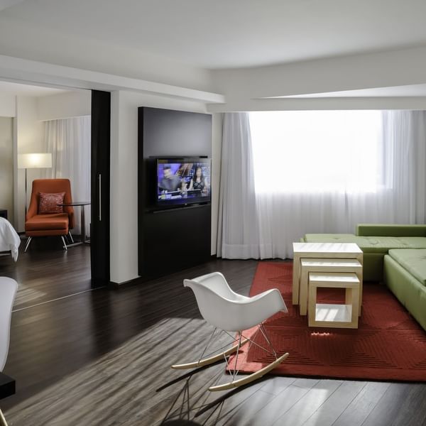 The living area of Junior Suite with lounges at Fiesta Inn
