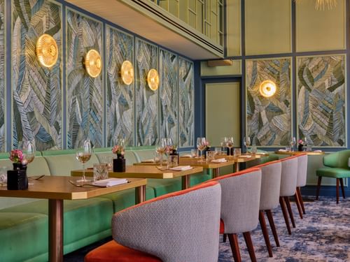 Elegant dining area with artistic architecture at The Capital Hotel, Apartments & Townhouse - London