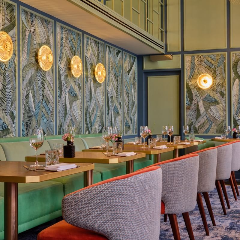 Elegant dining area with artistic architecture at The Capital Townhouse