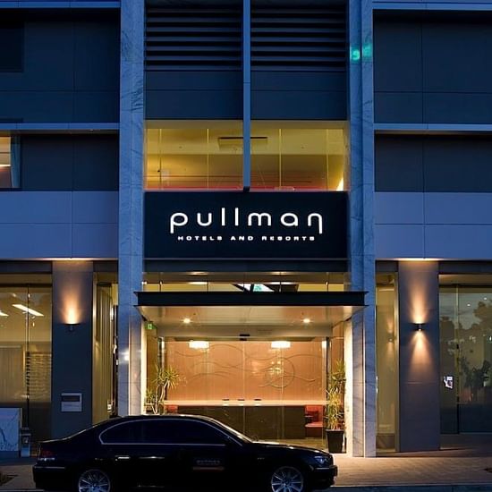 Exterior view of Pullman Sydney Olympic park at night