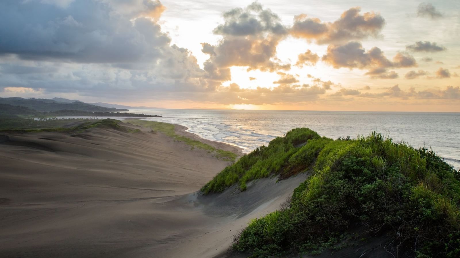 Sigatoka Sand Dunes National Park with Golden sunset by rolling sand dunes near The Naviti Resort - Fiji