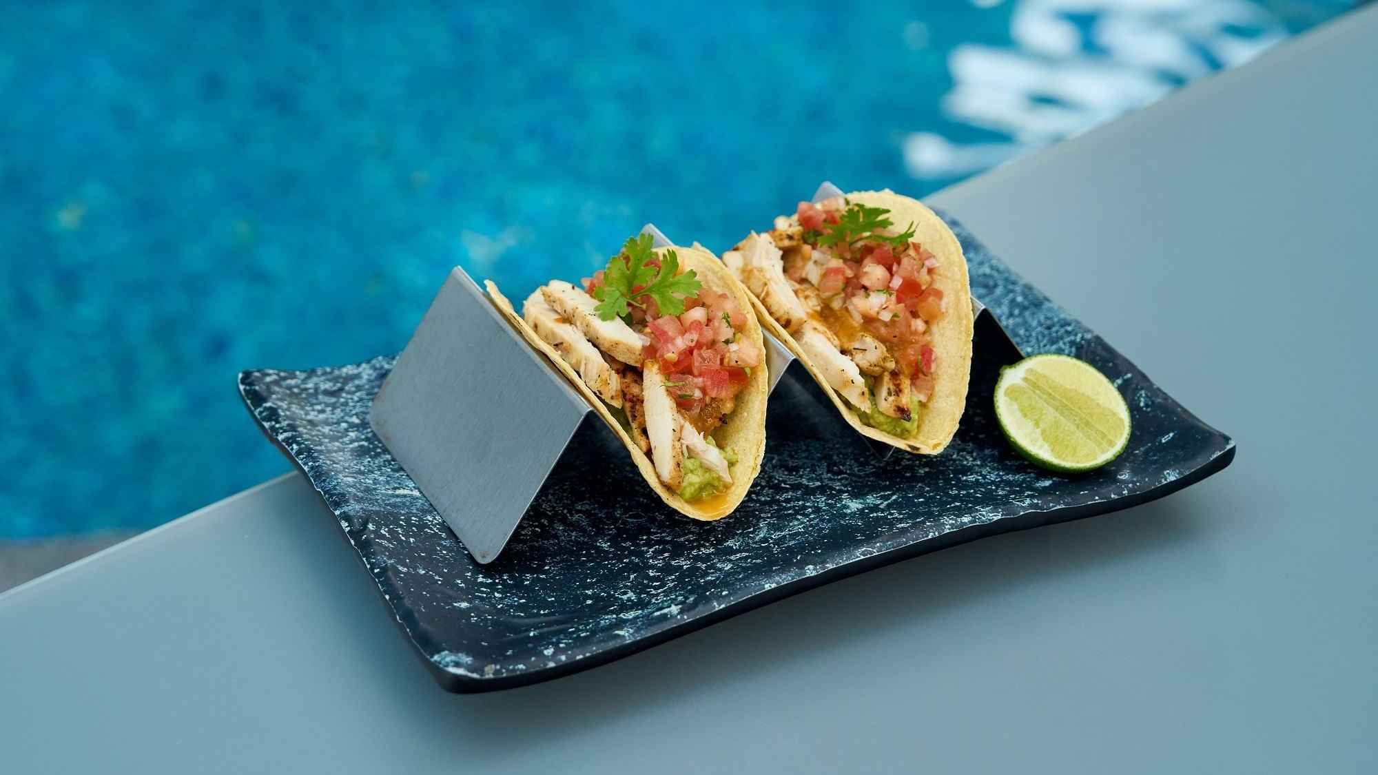 Tacos served on the pool edge by Malibu Deck Pool bar at Paramount Hotel Dubai