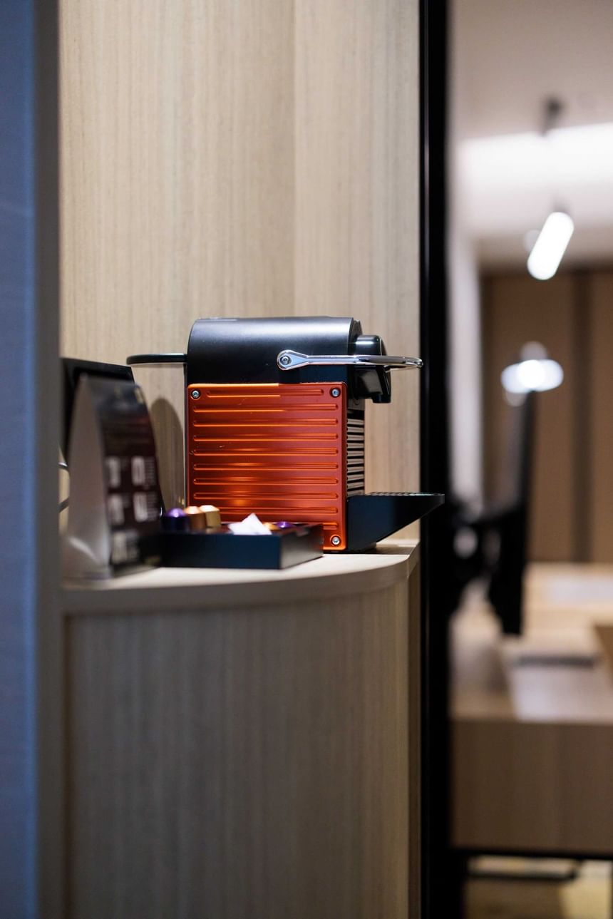 Close-up of a coffee machine on a table at Park Hotel Hong Kong