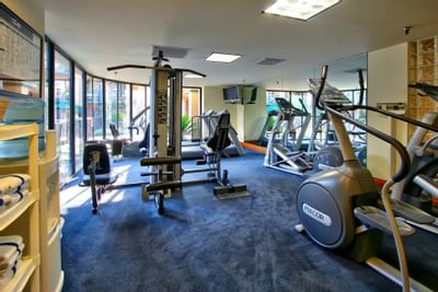 Interior of the fully equipped gym at MCM Elegante Beaumont