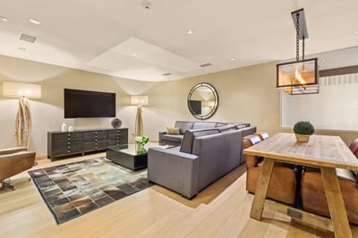 Modern Living room interior in VIP Suite at The J House Greenwich, luxury hotel in Fairfield County for business travelers
