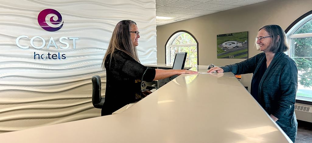 Coast Swift Current Hotel Lobby with Guest