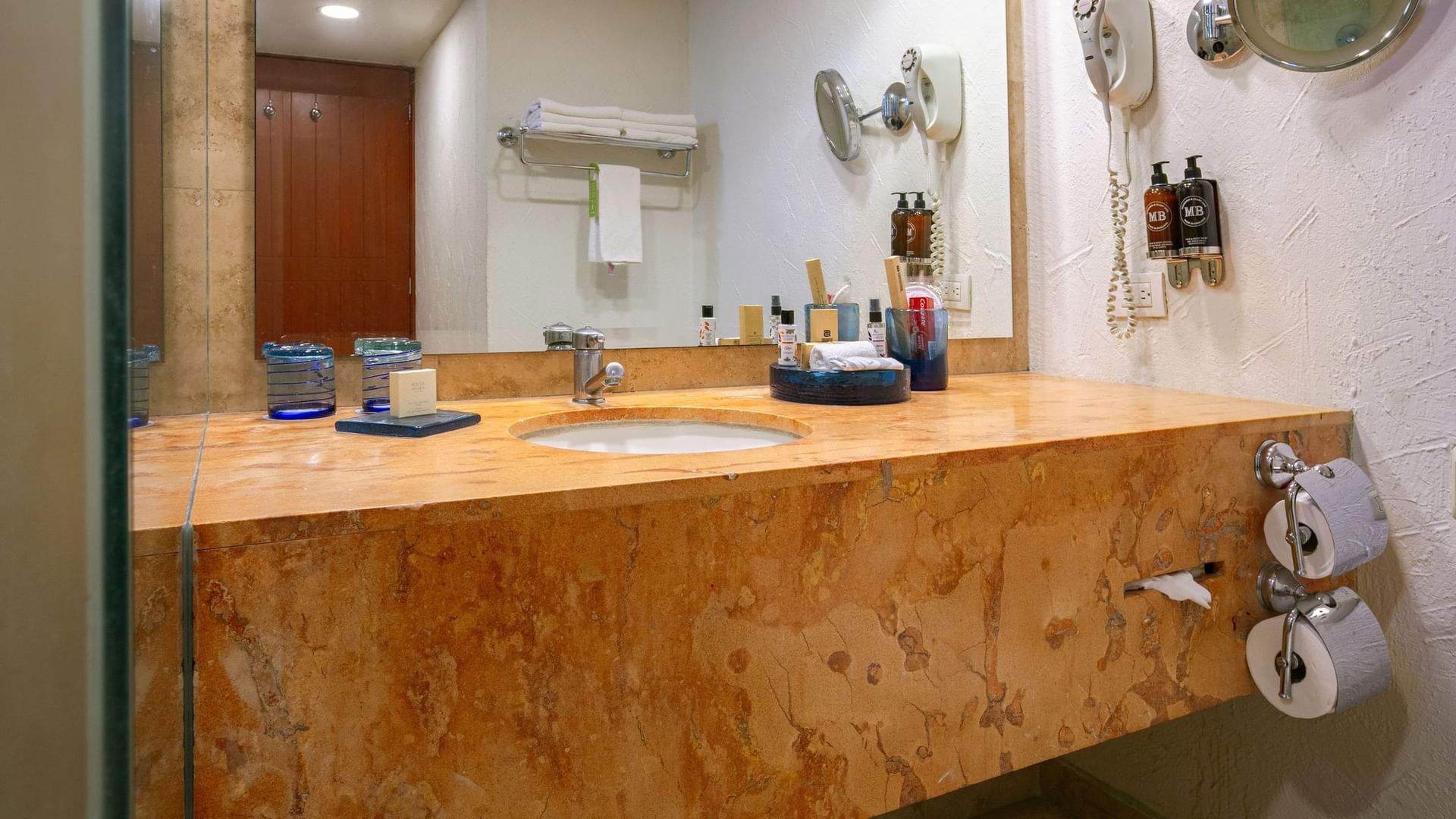 Bathroom sink and mirror in the King Real Suite at Camino Real Guadalajara in Zapopan