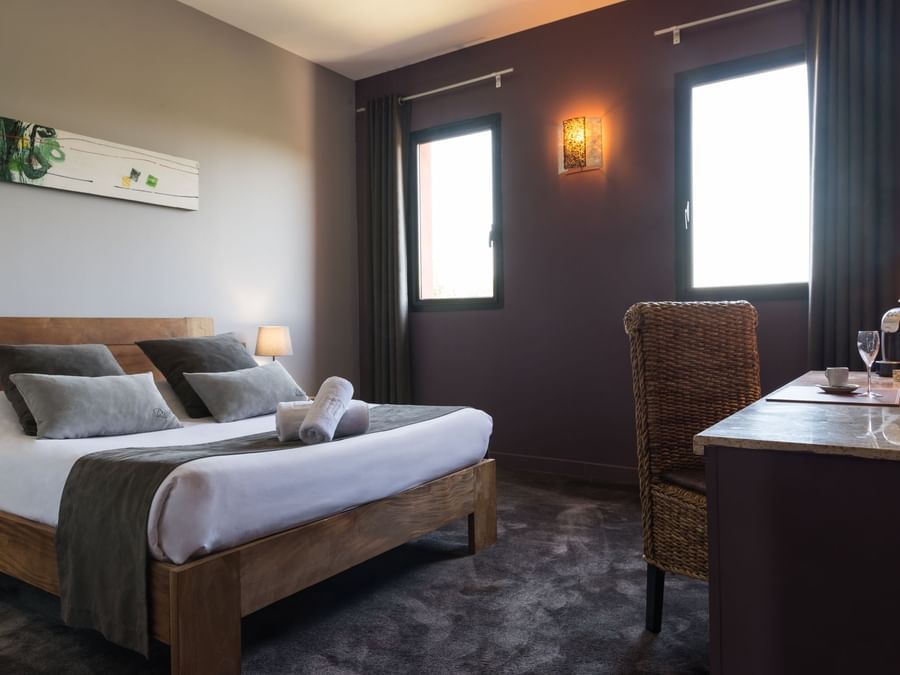 The Deluxe ​room for one or two people at The Originals Hotel