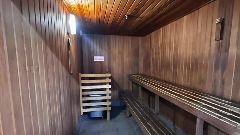 Interior of a wooden sauna with benches at Mercure Kooindah Waters