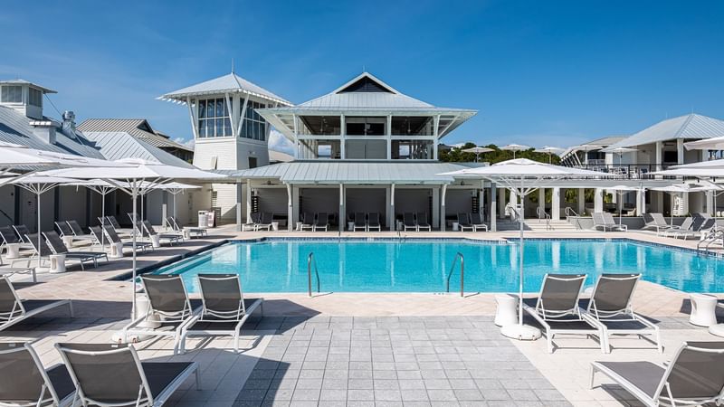 The outdoor pool surrounded by sunbeds at WaterColor Inn
