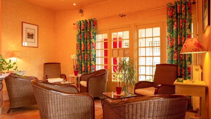 A living room with furniture at Hotel Clos Sainte Marie