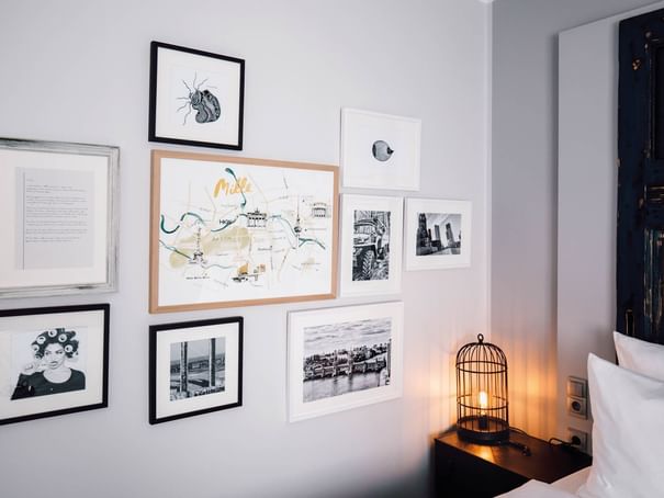 Frames hangs on the wall in Junior Suite at Hotel Berlin Berlin