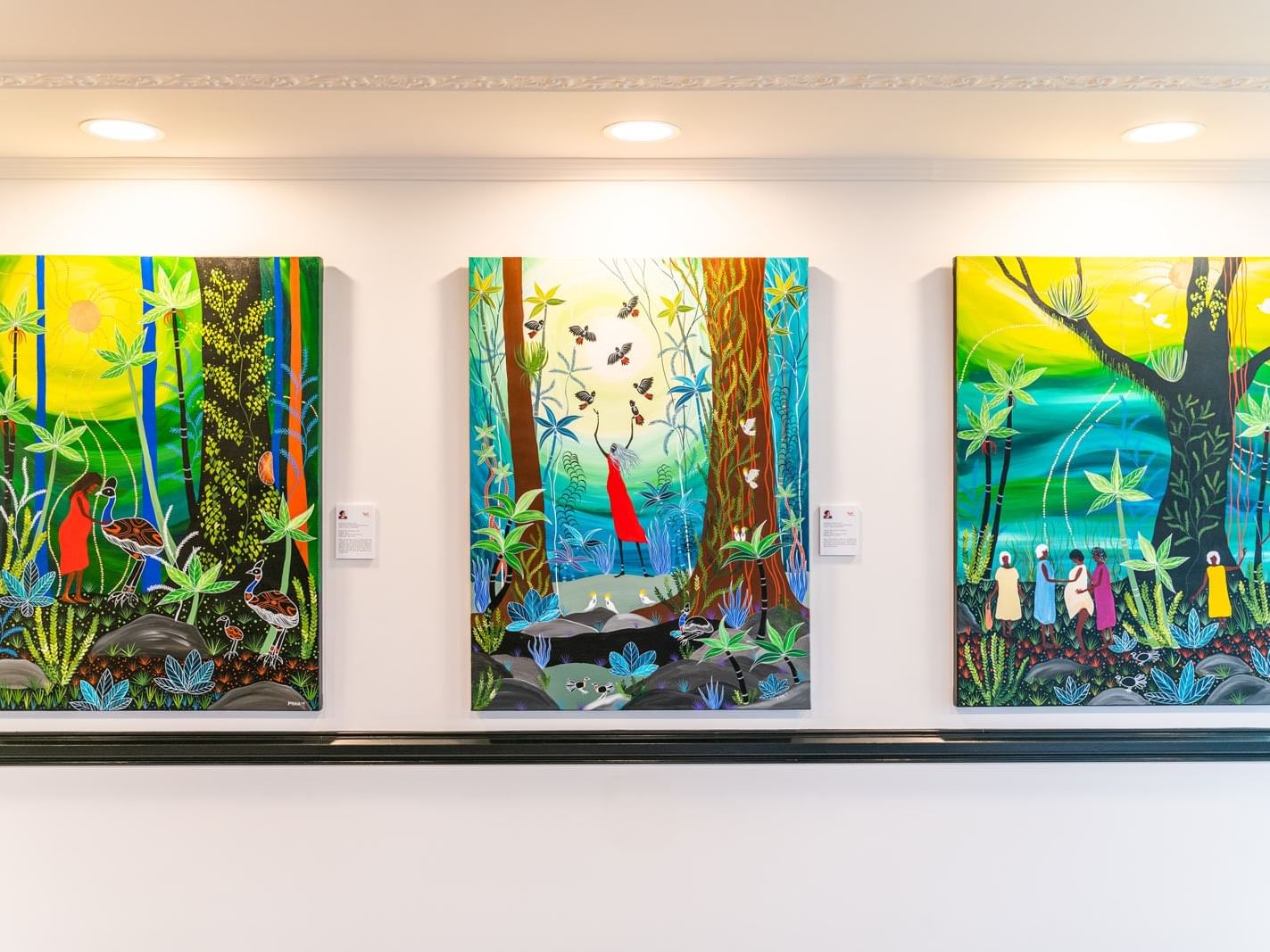 Three colorful nature art wall paintings at Pullman Cairns